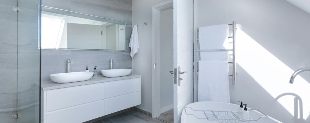 All white bathroom remodel in wisconsin after photo